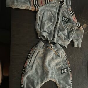Gently used track suit Burberry